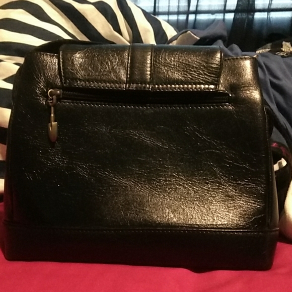 Black purse with brass accents and crossbody strap - Picture 4 of 6